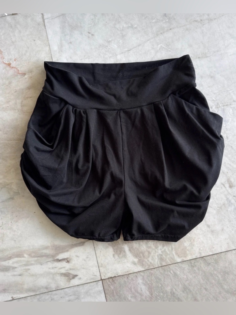 Conceited black harem style shorts with pockets